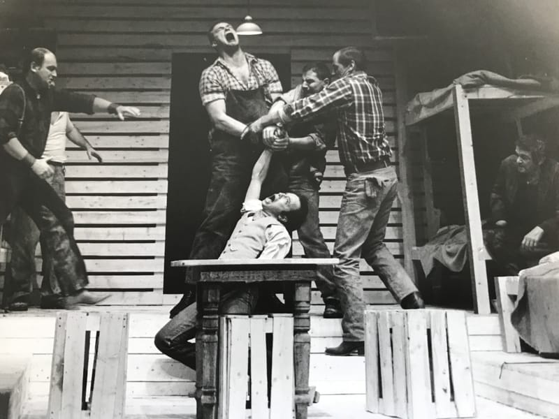 LENNIE CRUSHES CURLY'S HAND. to