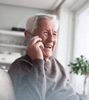 senior-man-telephoning-with-smart-phone-at-home